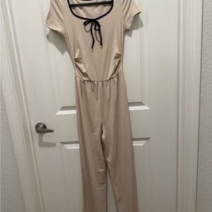 Elegant Cream Jumpsuit with Black Trim